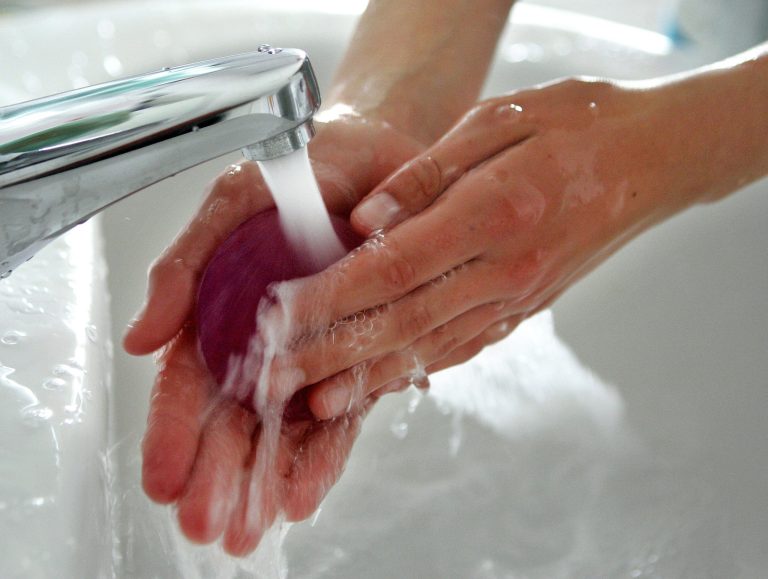 The tiny beads often get flushed out into the water supply and end up in rivers, lakes and oceans. (AP Photo/Michael Probst)