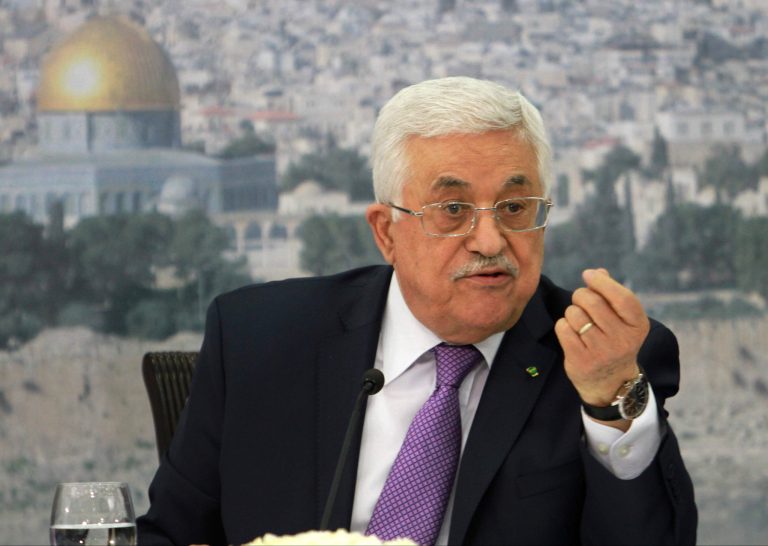 FILE - In this file photo taken Tuesday, April 29, 2014, Palestinian President Mahmoud Abbas speaks during a meeting with Palestinian businessmen from East Jerusalem to set up a national fund to support the Palestinian residents of East Jerusalem, at his office in the West Bank city of Ramallah. Abbas has accused Hamas of needlessly extending fighting in the Gaza Strip, causing a high death toll. He told Palestine TV in remarks broadcast Friday, Aug. 29, that 