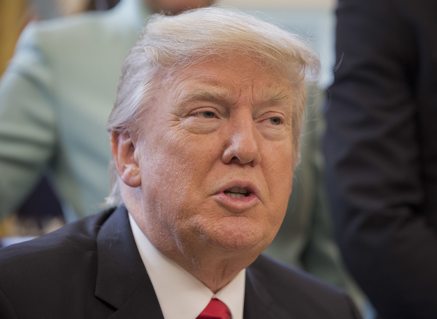 Like Obama, Trump launches outside political group