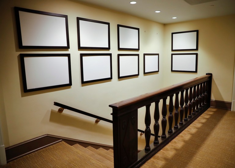 Photos of President Barack Obama and his family, that for years have lined the walls of corridors in the West Wing of the White House in Washington, are now blank and empty, Thursday, Jan. 19, 2017. (AP Photo/Pablo Martinez Monsivais)