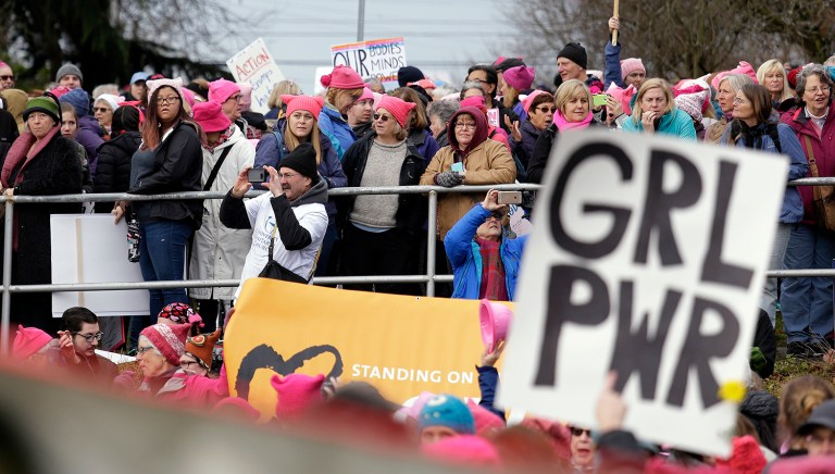 Many women can't take the day off to make a political statement. (AP Photo/Elaine Thompson)