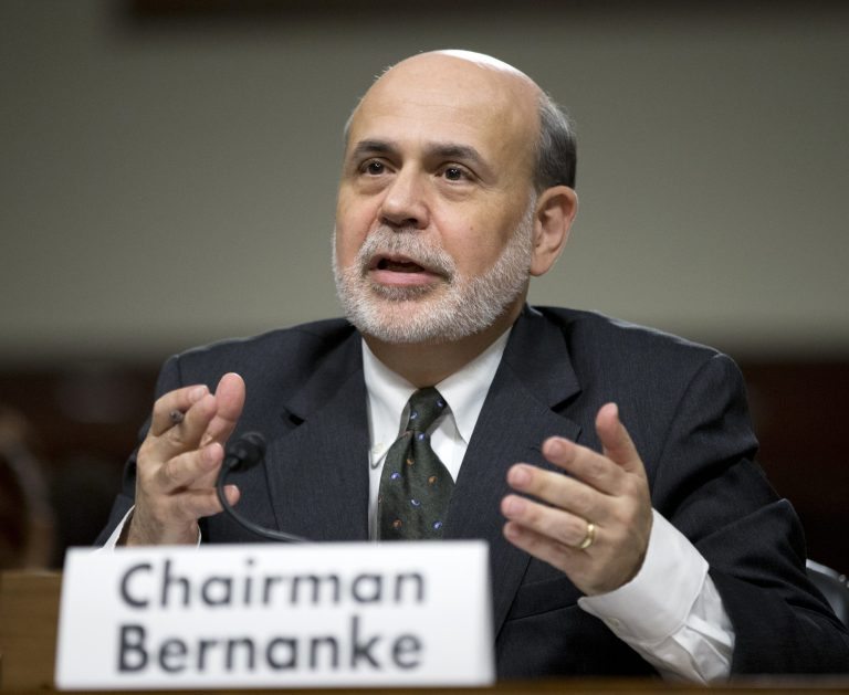 Four years into the recovery, Federal Reserve Chairman Ben Bernanke reports that the Fed will continue its rock-bottom interest rates and accommodative monetary policy. (AP Photo/Manuel Balce Ceneta)