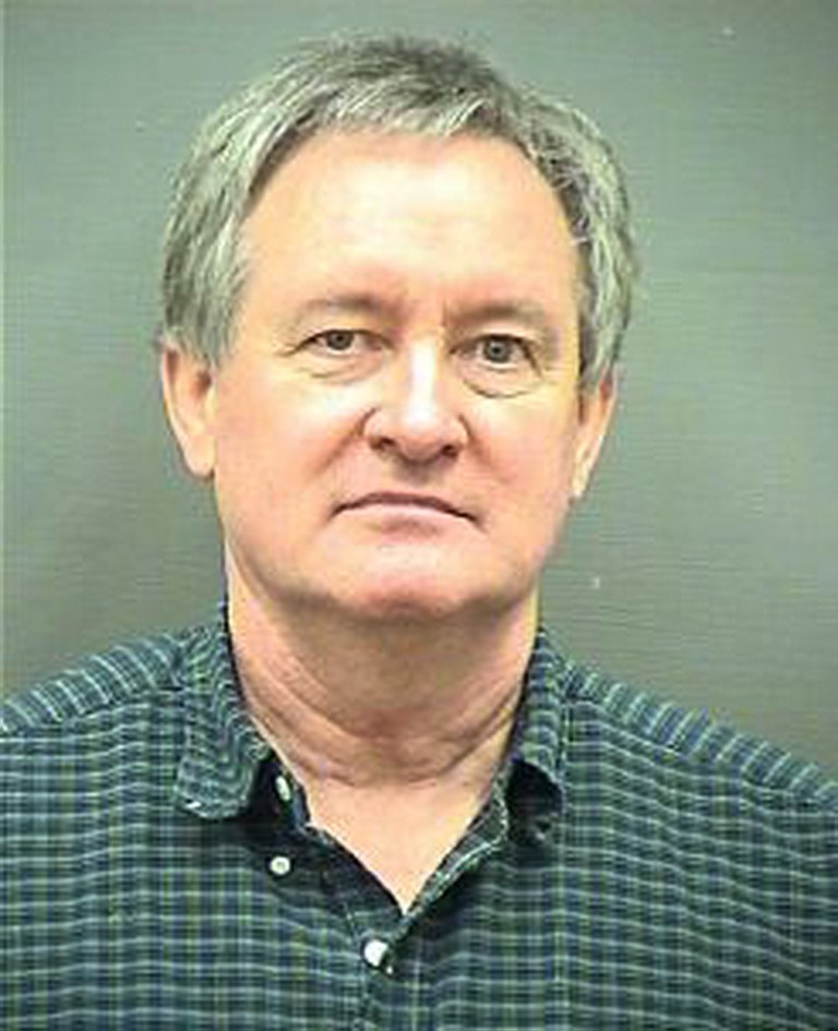   This Sunday, Dec. 23, 2012 booking photo provided by the Alexandria, Va. Police Department shows Idaho U.S. Sen. Michael Crapo. Crapo was arrested early Sunday morning, Dec. 23, 2012 and charged with driving under the influence in a Washington, D.C., suburb, authorities said. (AP Photo/Alexandria Police Department)  