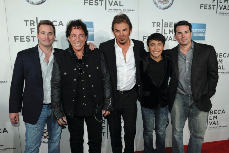 NEW YORK, NY - APRIL 19: Musicians Neal Schon, Jonathan Cain, and Arnel Pineda of Journey (C) with associate producers David Paterson and John Paterson attend the 