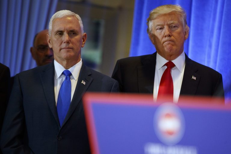 President-elect Donald Trump stands with Vice President-elect Mike Pence before his a news conference in the lobby of Trump Tower in New York, Wednesday, Jan. 11, 2017. (AP Photo/Evan Vucci)