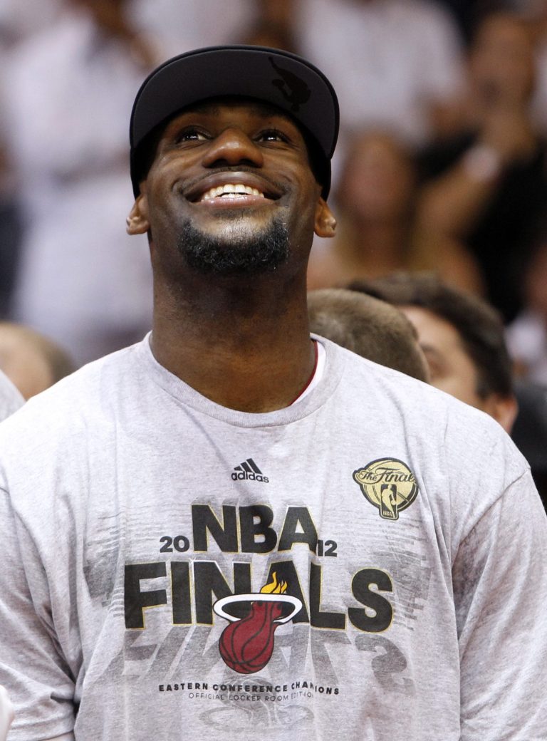   Miami Heat's LeBron James smiles during the trophy presentation following the Heat's 101-88 victory over the Boston Celtics in Game 7 in the NBA basketball playoffs Eastern Conference finals, Saturday, June 9, 2012, in Miami. (AP Photo/Lynne Sladky)  