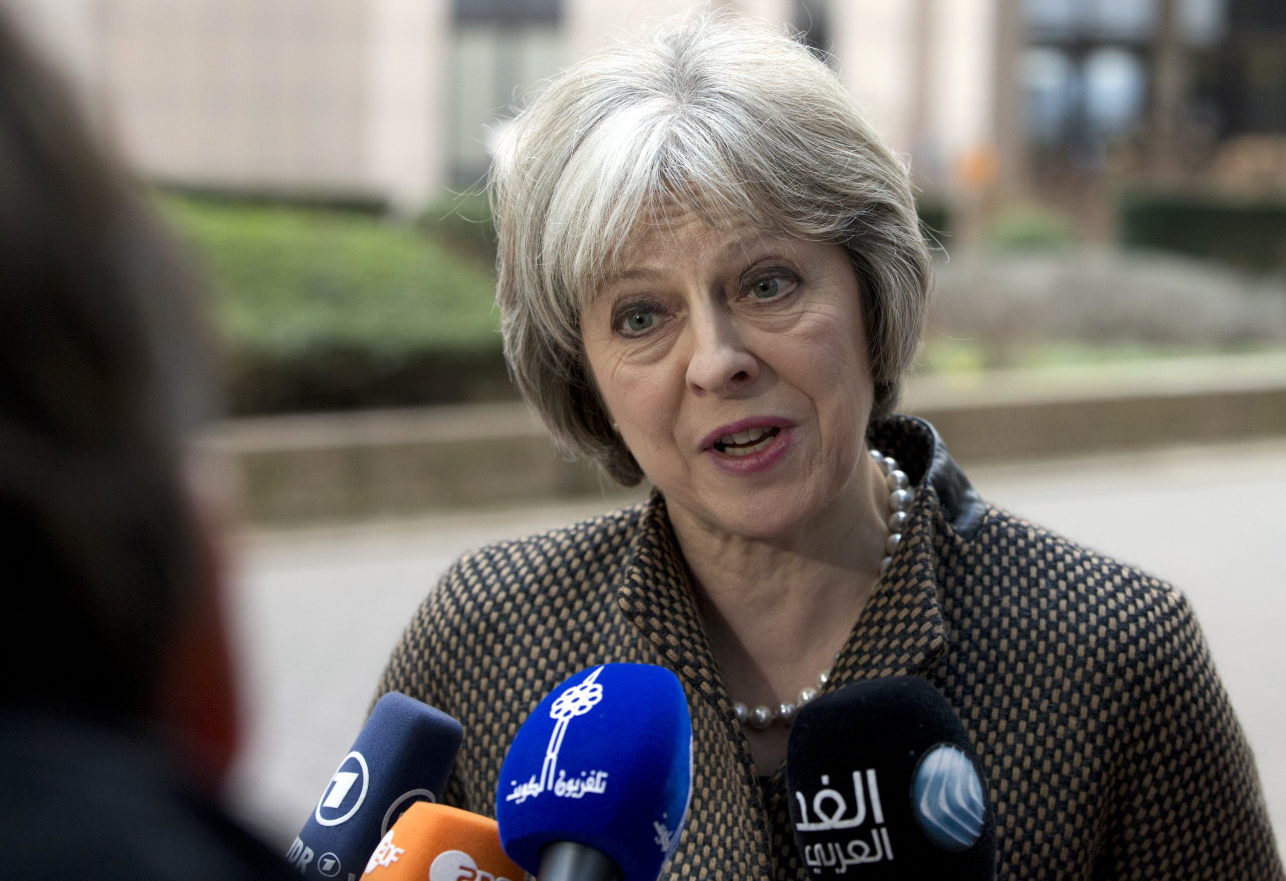 UK leader fights back against critics amid Brexit upheaval