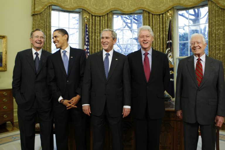 Presidents George H.W. Bush, Barack Obama, George W. Bush,  Bill  Clinton and Jimmy Carter meet after Obama's first election in 2008. Because of health issues, neither Bush will attend the 50th anniversary of the March on Washington Wednesday.  (AP Photo/J. Scott Applewhite)