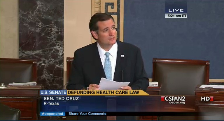 In an Image made from a CSPAN broadcast, Sen. Ted Cruz continues to speak on the floor of the Senate at 5:21 a.m. Wednesday. Since Tuesday afternoon, Cruz --- with occasional remarks by Sen. Mike Lee, R-Utah, and other GOP conservatives --- has controlled the Senate floor and railed against Obamacare. (AP Photo/CSPAN)