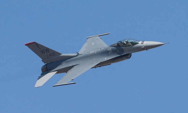 An F-16 Fighting Falcon is seen.