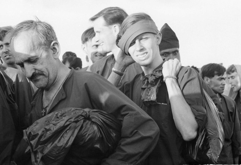 A group of American POWs are released by the Viet Cong at Loc Ninh, 75 miles north of Saigon, Feb. 12, 1973. (AP Photo)