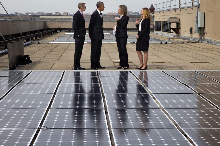 President Obama tours solar panels on the roof of the Energy Department in D.C., Thursday, March 19, 2015. (AP Photo)