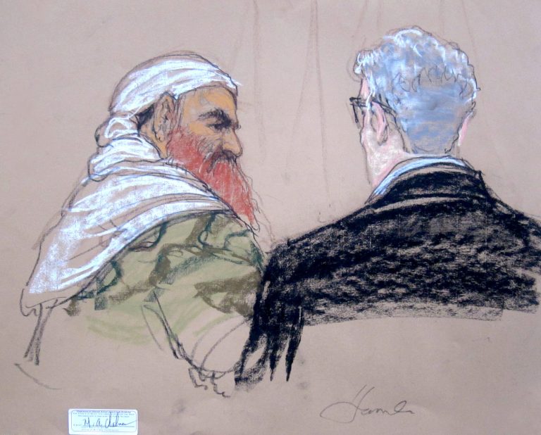 In this pool photo of a Pentagon-approved sketch by court artist Janet Hamlin, defendant Khalid Sheikh Mohammed, left, speaks with lead defense lawyer David Nevin during a pretrial hearing at the Guantanamo Bay U.S. Naval Base in Cuba, Monday, April 14, 2014.