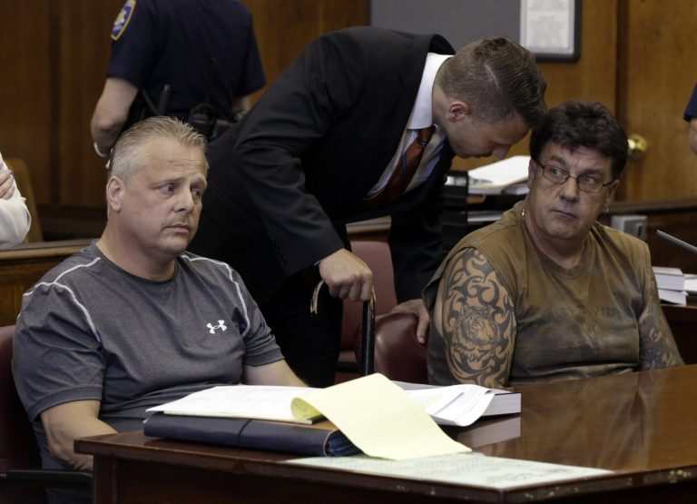 Defendants Nicholas Bernhard, left, and Scott O'Neill, listen during their arraignment proceedings, in New York,  Tuesday, July 9, 2013. (Richard Drew/AP)