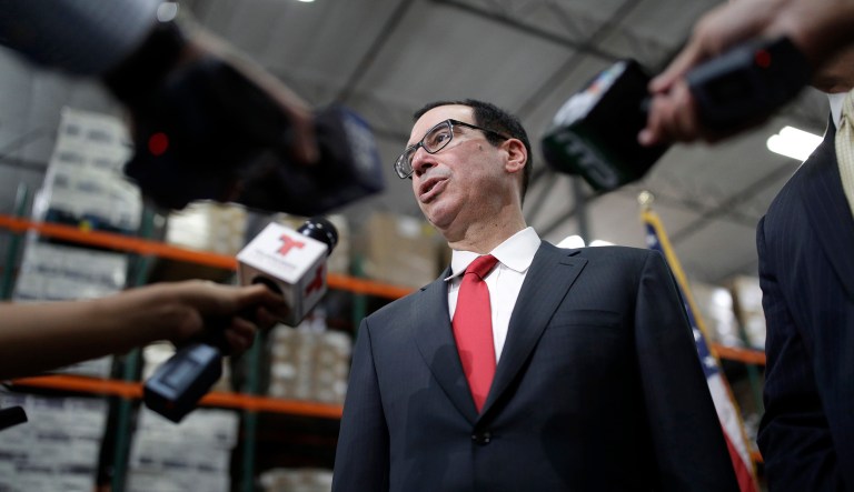 The Treasury Department says that concerns about secure communications with government agencies is what prompted Secretary Steven Mnuchin to inquire about using a government plane for his European honeymoon in August. (AP Photo/John Locher, File)