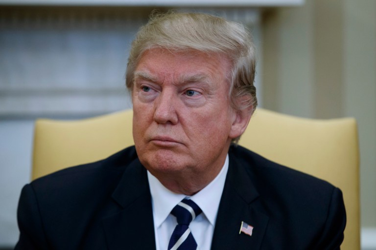 Trump says he plans to follow through on his tough talk during the campaign during a meeting with Xi. (AP Photo/Evan Vucci)