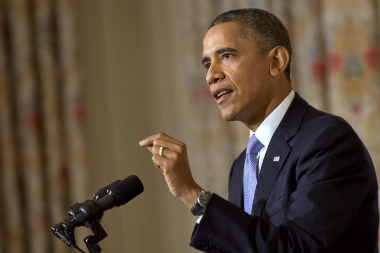 President Barack Obama speaks in the State Dining Room of the White House in Washington on Thursday, Oct. 17, 2013. Lawmakers Wednesday voted to avoid a financial default and reopen the government after a 16-day partial shutdown. (AP Photo/Jacquelyn Martin)