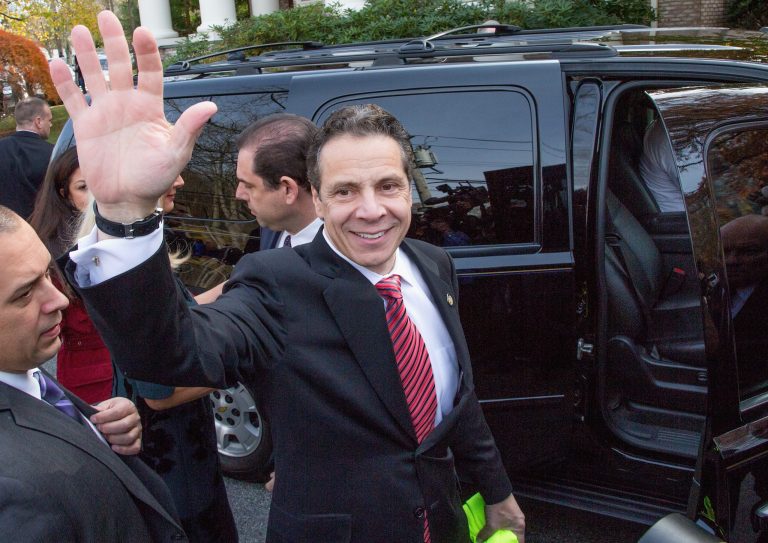 New York State Governor, Andrew Cuomo, greets voters during the 2014 general election at the Presbyterian Church of Mount Kisco on Nov. 4, 2014, in Mt. Kisco, New York. (Photo by Kenneth Gabrielsen/Getty images)