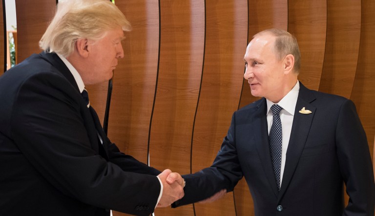 President Trump shakes hands with Russian President Vladimir Putin before the first working session of the G-20 summit in Hamburg, Germany. (Steffen Kugler/Presse- und Informationsamt der Bundesregierung via AP)