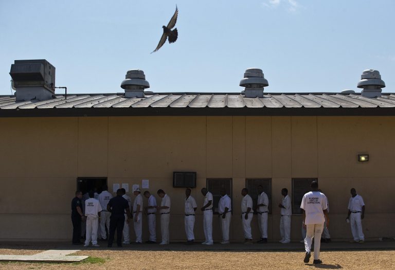 Nearly 70 percent in the six swing states also said the federal government is spending too much to keep nonviolent offenders behind bars, and agreed the criminal justice system's main goal should be rehabilitating criminals to become productive members of society. (AP Photo/Brynn Anderson)