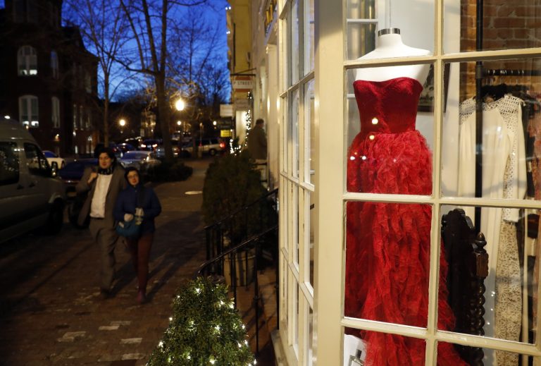 Designer Inaugural ball dresses are for sale at Ella-Rue including this red Badgley Mischka for $795 seen in the window in the Georgetown area of Washington. (AP Photo/Alex Brandon)