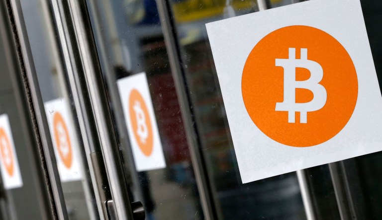 In recent weeks, some companies have sent their stocks soaring by announcing that they are getting involved with Bitcoin or blockchain technologies as cryptocurrency prices have soared. (AP Photo/Mark Lennihan, File)