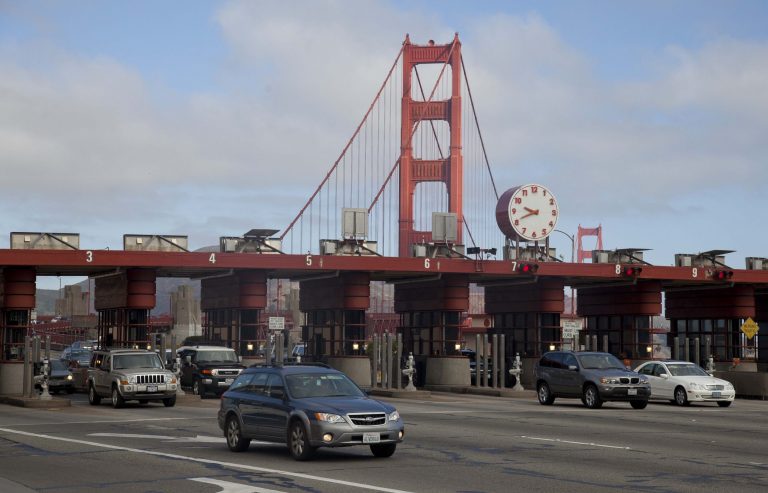 Drivers make their way past toll booths at the Golden Gate Bridge in San Francisco in September 2012. (AP Photo/Eric Risberg)