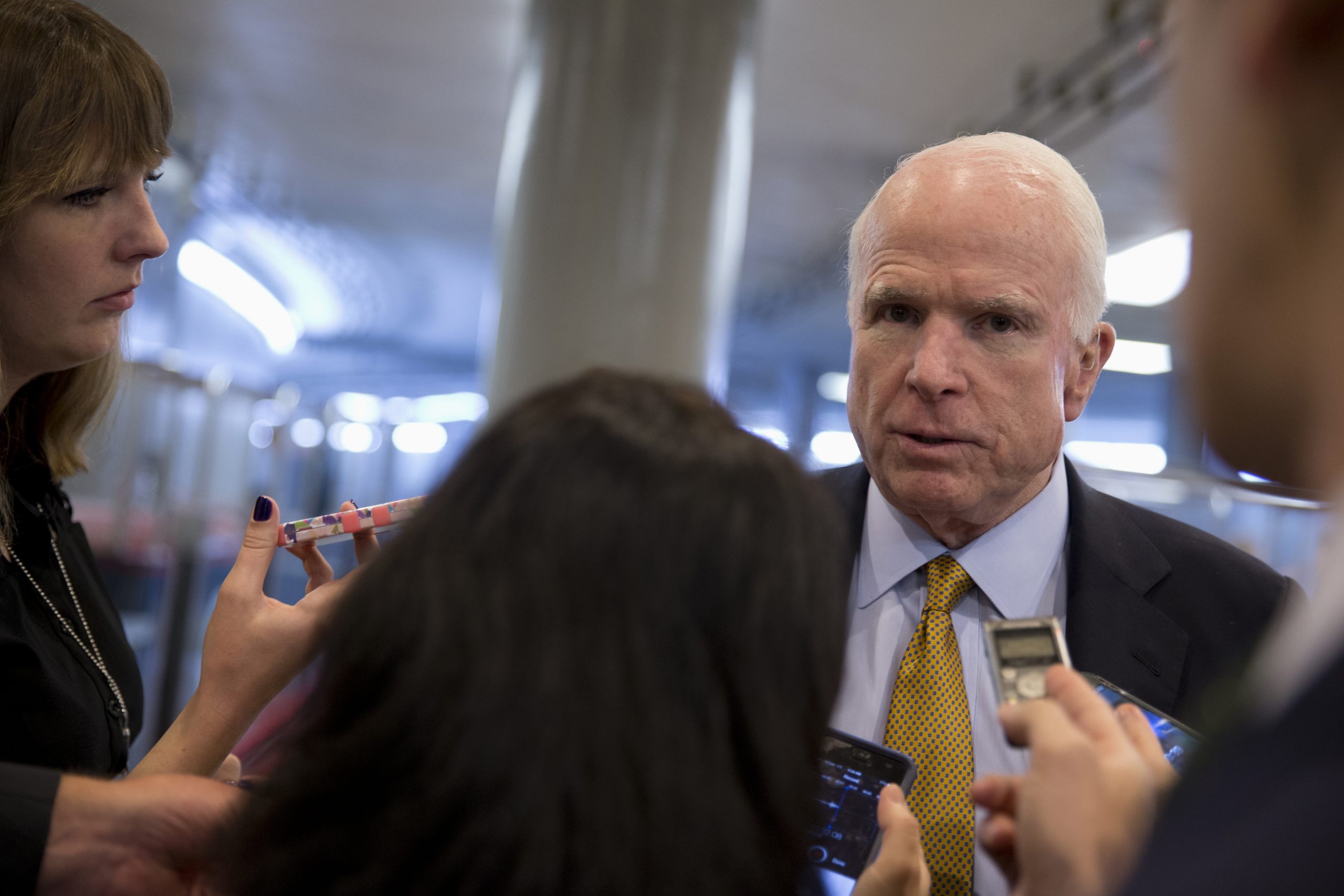 McCain threatens to sue Obama over Gitmo
