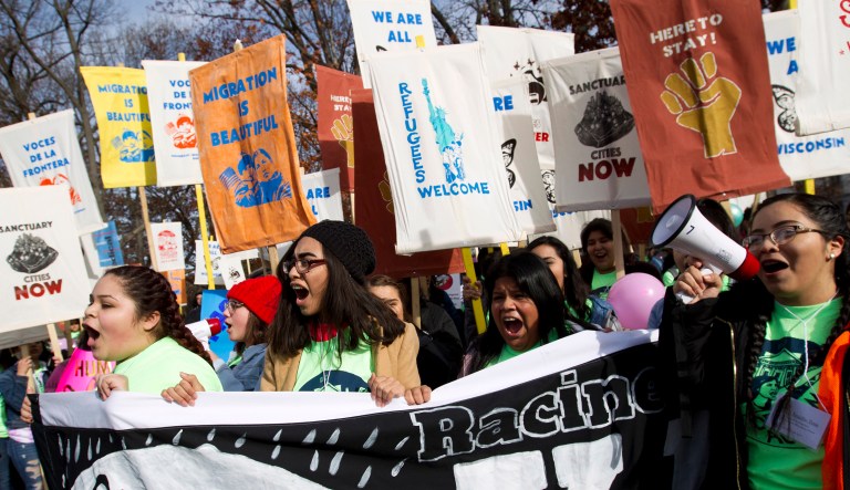Demonstrators march during an immigration rally in support of the Deferred Action for Childhood Arrivals. DACA has been a difficult negotiation for Republicans and Democrats. Democrats are insisting on legislation that reconstitutes the program that Trump is set to wind down. ( AP Photo/Jose Luis Magana)
