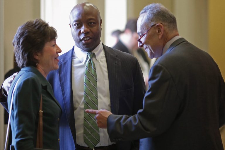 Sen. Susan Collins (R-MD), Sen. Tim Scott (R-SC) and Sen. Charles Schumer (D-NY) visit before heading into their respective policy luncheons at the U.S. Captiol February 3, 2015 in Washington, D.C. (Photo by Chip Somodevilla/Getty images)