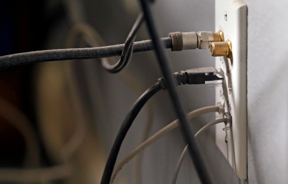Broadband Internet expansion: Fight brewing over how to pay for it all
