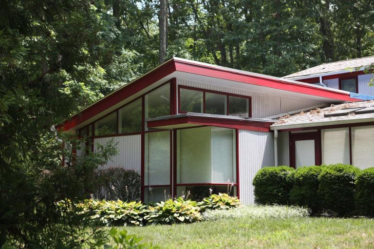 A house with distinctive architecture is shown in the Hollin Hills community of Alexandria, Va. Home prices in the District of Columbia reached a record in July, surpassing the boom of 2005. (Examiner file photo)