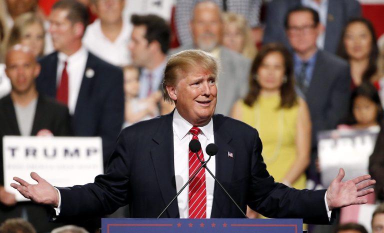 Republican presidential candidate Donald Trump speaks at a rally before a crowd of over 3,500 Saturday, July 11, 2015, in Phoenix. (AP Photo/Ross D. Franklin)