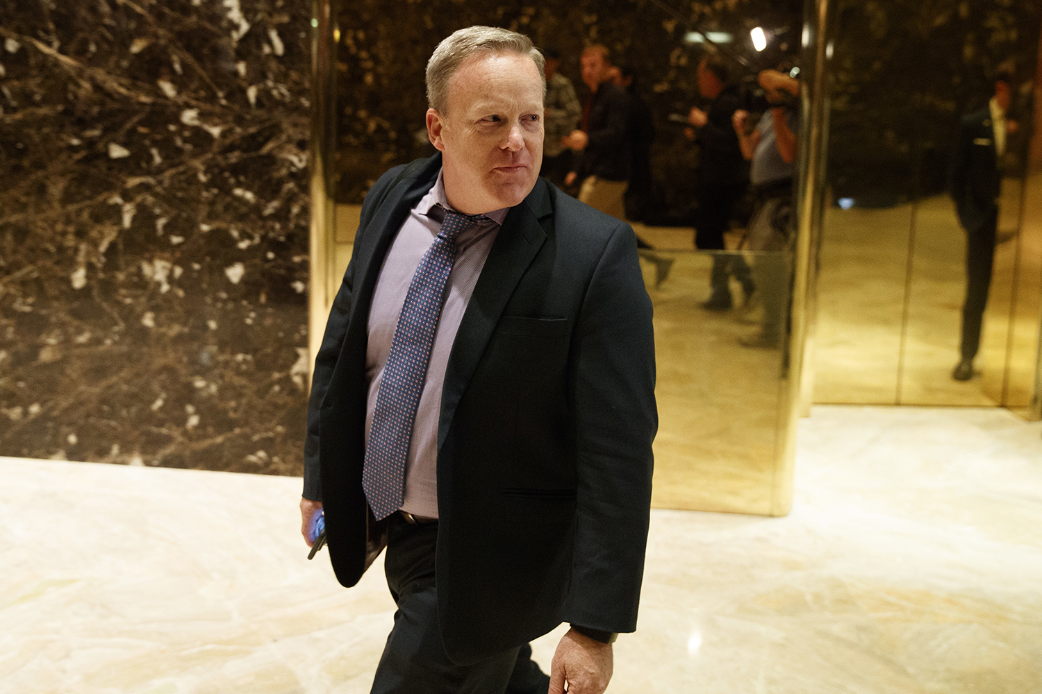 Trump team disputes report on planned changes to spy agencies