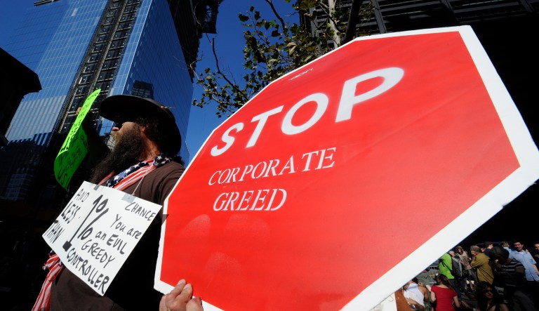 Not everyone agrees that capitalism and democracy are good. As seen in an opinion piece in Splinter, some argue that there is a moral foundation for thievery &mdash; particularly against the rich. (AP Photo/Henny Ray Abrams)