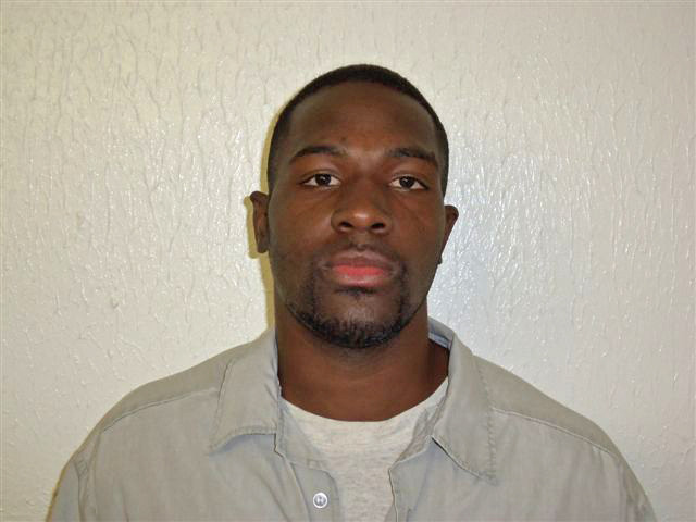 This March 21, 2011 photo provided by the Oklahoma Department of Corrections shows Alton Nolen, of Moore, Okla. Prison records indicate that Nolen, the suspect in the beheading of a co-worker at an Oklahoma food processing plant Thursday, had spent time in prison and was on probation for assaulting a police officer. (AP Photo/Oklahoma Department of Corrections)