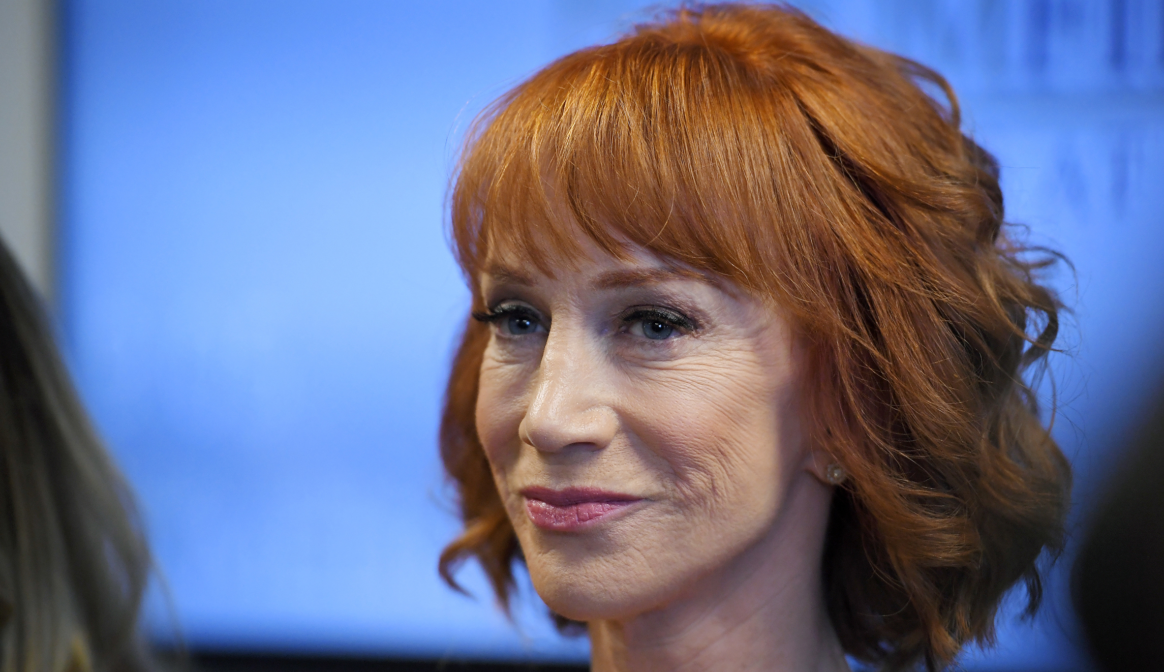 Kathy Griffin appears at comedy gig wearing Trump mask