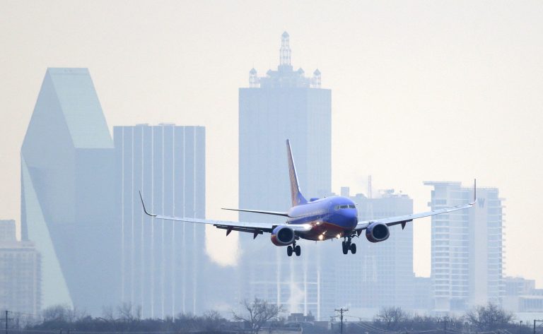 FILE - In this Feb. 3, 2014 file photo, a Southwest Airlines jet plane lines up for a landing at Love Field in Dallas. Southwest Airlines reports quarterly earnings on Thursday, April 24, 2014. (AP Photo/LM Otero, File)