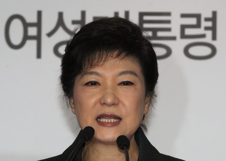   South Korea's president-elected Park Geun-hye speaks during a press conference at the headquarters of Saenuri Party in Seoul, South Korea, Thursday, Dec. 20, 2012. Park was elected South Korean president Wednesday, becoming the country's first female leader despite the incumbent's unpopularity and her own past as the daughter of a divisive dictator. The letters read 