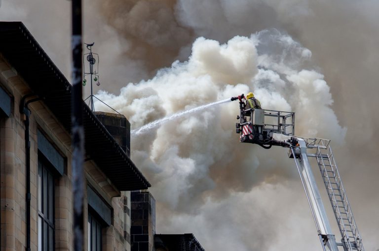 In this photo released by David Barz , firefighters attend a fire at  Glasgow School of Art, Glasgow, Scotland, Friday, May 23, 2014.    A major fire has devastated the Glasgow School of Art, one of the city's major landmarks. The Scottish Fire and Rescue Service said the blaze, which broke out just after noon on Friday, was a 