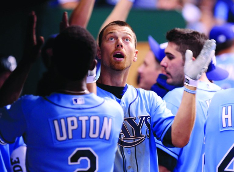 After finishing in last place in the AL East in nine of their first 10 years, the Tampa Bay Rays have had four straight winning seasons. (J. Meric/Getty Images)