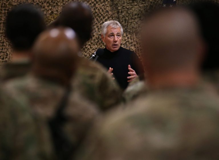 U.S. Secretary of Defense Chuck Hagel, speaks with U.S. troops at the Kandahar air base in Afghanistan, Sunday, Dec. 8, 2013. Hagel spoke with U.S. troops and thanked them for being deployed for the holidays. (AP Photo/Mark Wilson, Pool)