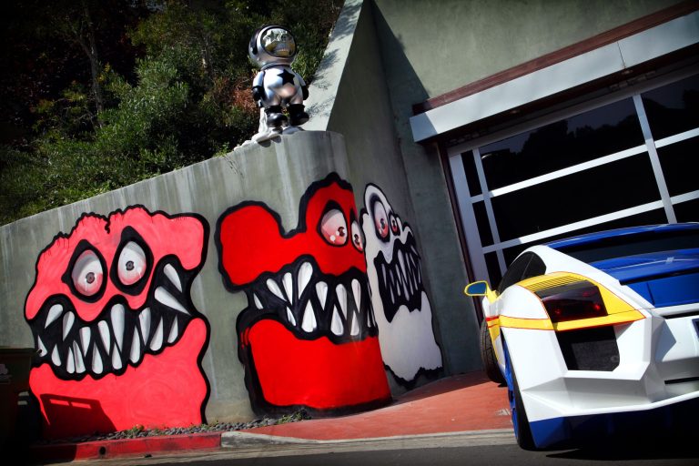 This May 10, 2013 photo shows Graffiti painted on the walls of the home of entertainer Chris Brown in Hollywood Hills, Calif. Neighbors are angry at Brown's street art painted outside his home and local residents are calling for fines to be brought against the pop star and demanding Brown remove the street art. (AP Photo/Los Angeles Times, Barbara Davidson) NO FORNS; NO SALES; MAGS OUT; ORANGE COUNTY REGISTER OUT; LOS ANGELES DAILY NEWS OUT; VENTURA COUNTY STAR OUT; INLAND VALLEY DAILY BULLETIN OUT; MANDATORY CREDIT, TV OUT