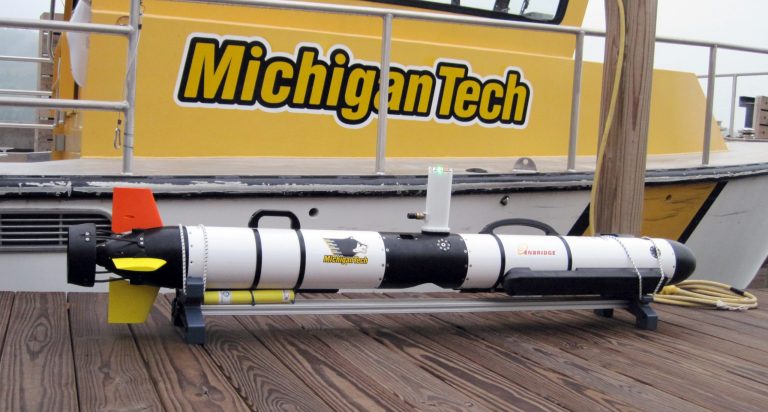 This undated photo proved by Michigan Technological University  shows an Iver 3 Autonomous Underwater Vehicle purchased by Enbridge Energy Partners for Michigan Technological University in Houghton, Mich. Michigan Tech's Great Lakes Research Center will use the device to conduct sonar inspections of Enbridge oil pipelines beneath the Straits of Mackinac. Some consider the pipes, laid in 1953, a symbol of the dangers lurking in the nation's sprawling web of buried oil and natural gas pipelines. (AP Photo/Michigan Technological University, Guy Meadows)