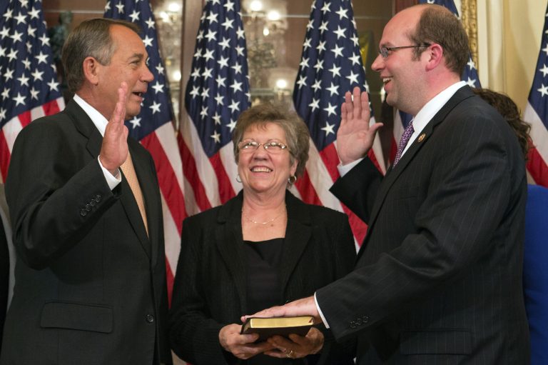 Rep.-elect Jason Smith, R-Mo., right, is ceremonially sworn in by Speaker of the House John Boehner, R-Ohio, at the Capitol in Washington, Wednesday, June 5. (AP Photo/Jacquelyn Martin)
