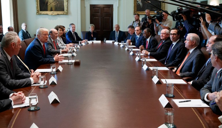 President Trump speaks during a Cabinet meeting at the White House. President Bill Clinton's defense secretary said Friday that he's embarrassed to watch President Trump's Cabinet fawn over Trump. (AP Photo/Evan Vucci)