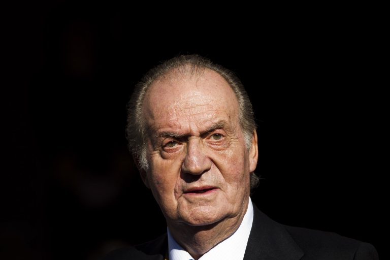 FILE - In this Tuesday, Dec. 27, 2011, file photo Spain's King Juan Carlos leaves after the official opening of the Parliament, in Madrid. Spain's King Juan Carlos plans to abdicate and pave the way for his son, Crown Prince Felipe, to take over, Spanish Prime Minister Mariano Rajoy told the country Monday in an announcement broadcast nationwide. The 76-year-old Juan Carlos oversaw his country's transition from dictatorship to democracy but has had repeated health problems in recent years. (AP Photo/Daniel Ochoa de Olza, File)