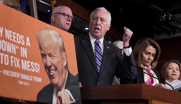 House Minority Whip Steny Hoyer, D-Md., center, told reporters Tuesday that even though government funding will expire after Feb. 8 &mdash; right in the middle of the Democratic retreat &mdash; they will still leave the Capitol and head to the shore for their annual gathering. (AP Photo/J. Scott Applewhite)