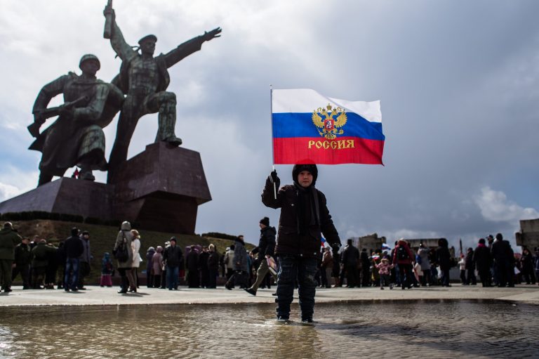 People celebrate the first anniversary of the signing of the decree on the annexation of the Crimea by the Russian Federation, on March 18, 2015 in Sevastopol, Crimea. Crimea, an internationally recognised Ukrainian territory with special status, was annexed by the Russian Federation on March 18, 2014. (Getty Image)