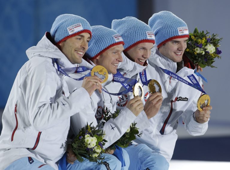 Team Norway, which won the gold medal in the team Gundersen large hill Nordic combined competition, pose with their medals at the 2014 Winter Olympics in Sochi, Russia, on Thursday. (AP Photo/Morry Gash)